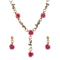Jewelry set with pink rose-shaped pendants on a gold chain against a white background
