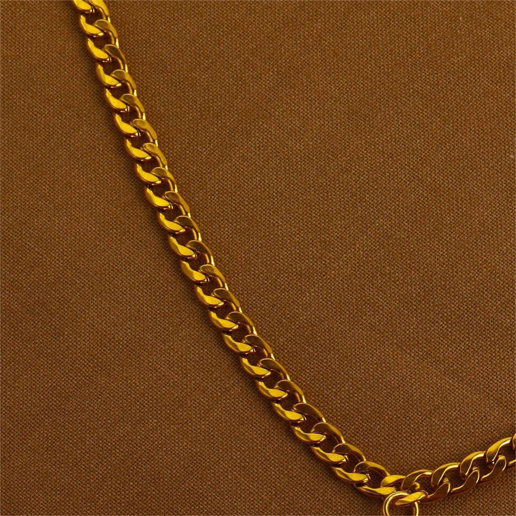 Gold chain on a brown background