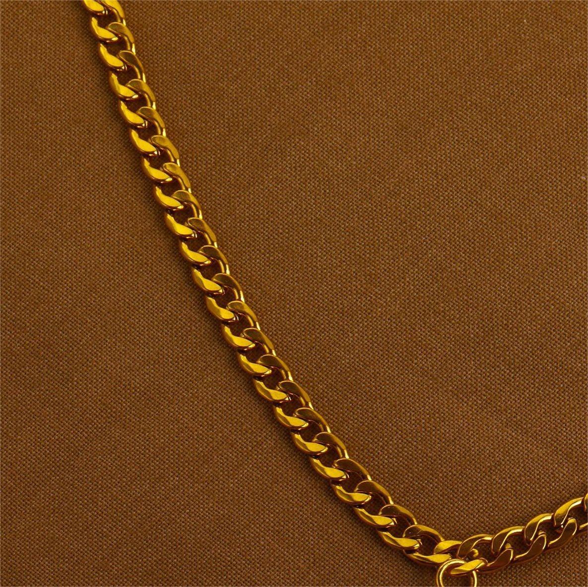 Gold chain on a brown background