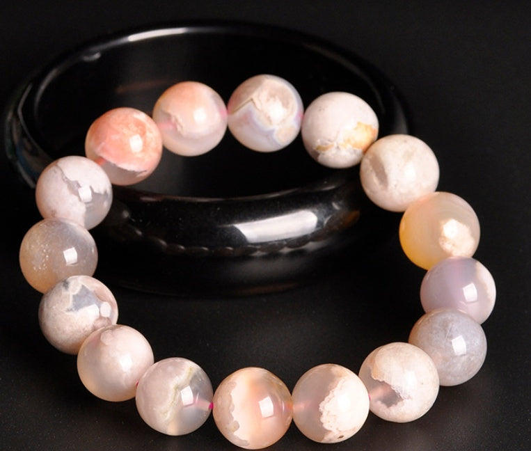 Pearl bracelet on a black background