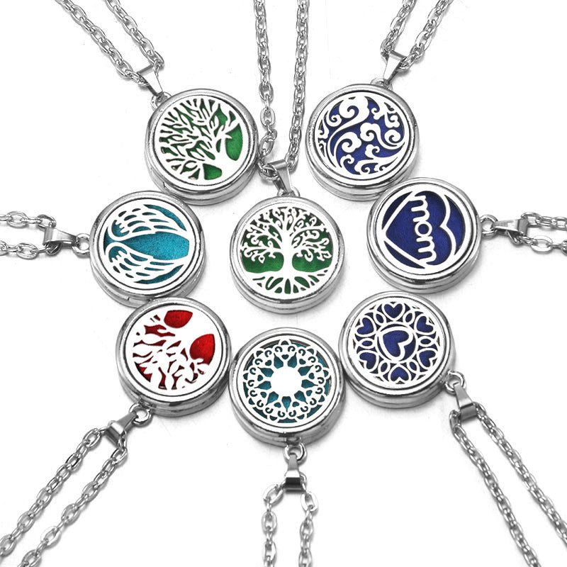 Collection of necklaces with round pendant designs on a white background