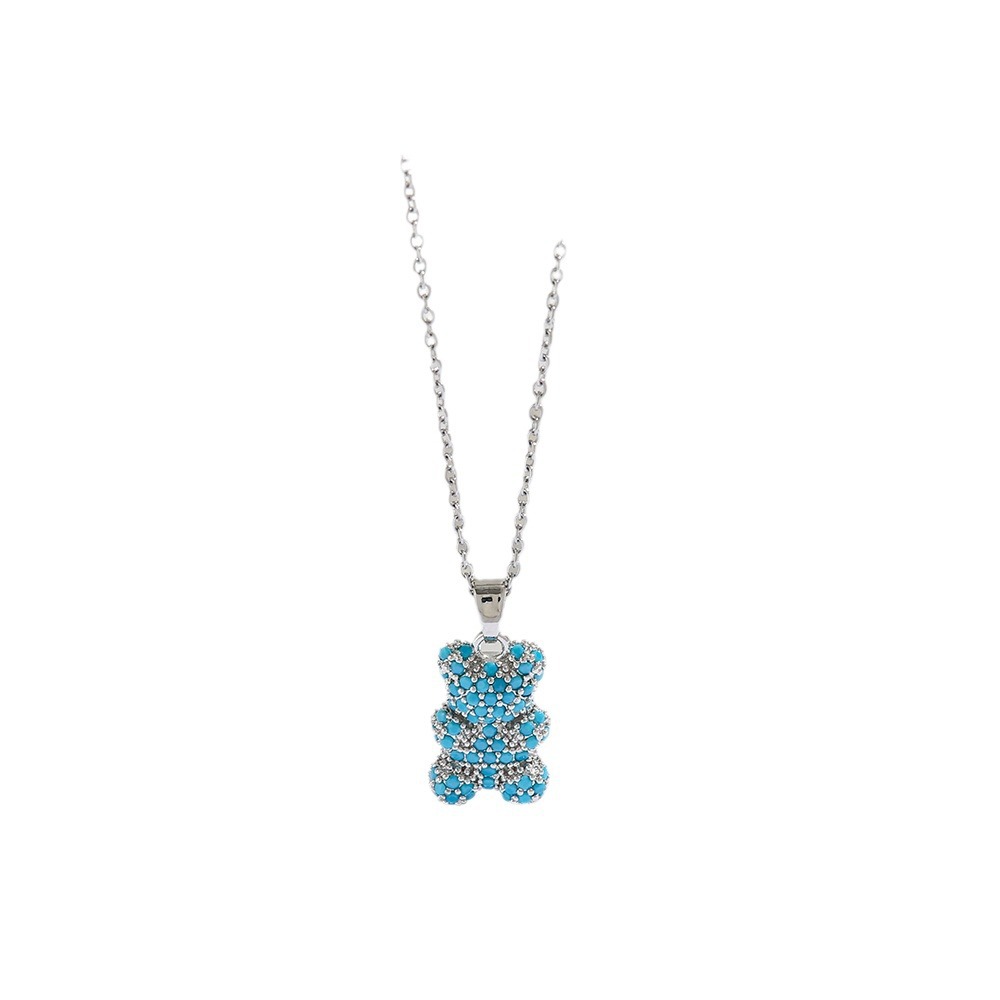 Turquoise teardrop pendant necklace on a white background