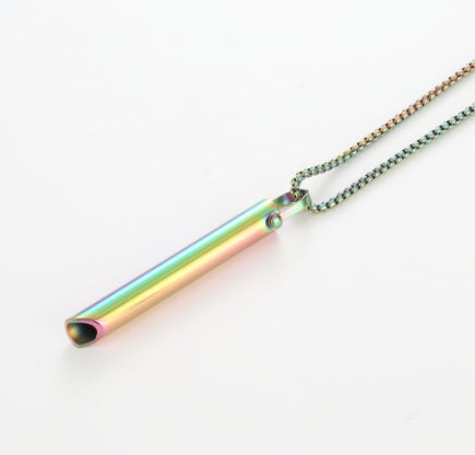 Multicolored cylindrical pendant on a chain against a white background