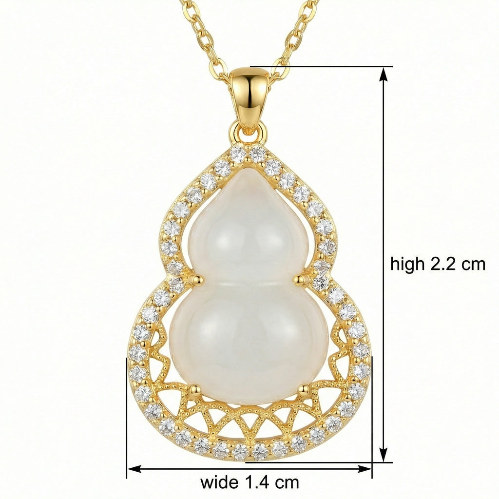 Gold necklace with a pearl pendant and measurements on a white background