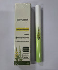 Green diffuser pen with packaging on a gray background