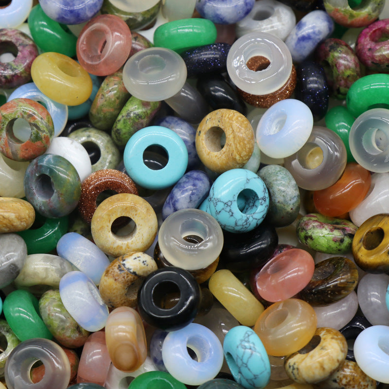 Assorted colorful beads of various shapes and sizes.