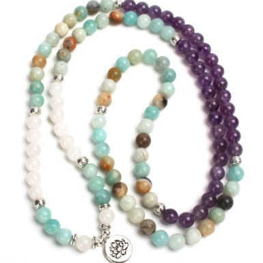 Three beaded necklaces with different color schemes on a white background