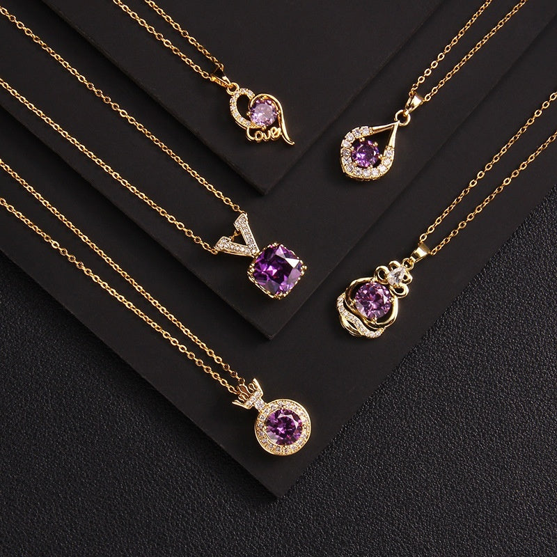 Gold necklaces with purple gemstone pendants on a black background