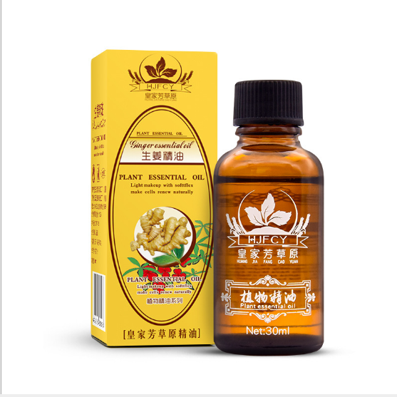 Ginger essential oil bottle and packaging on a white background