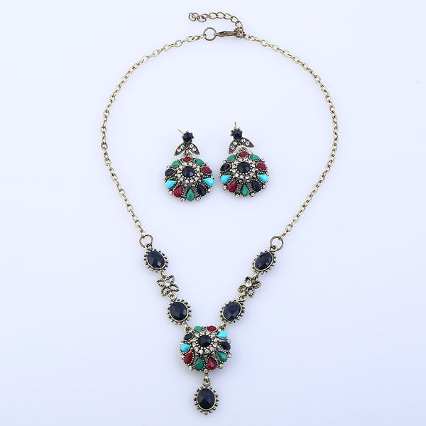 Jewelry set with necklace and earrings on a white background
