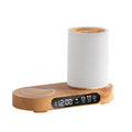White humidifier on a wooden base with digital display on a white background