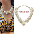 Shell necklace worn by a person and displayed on a white background with text.