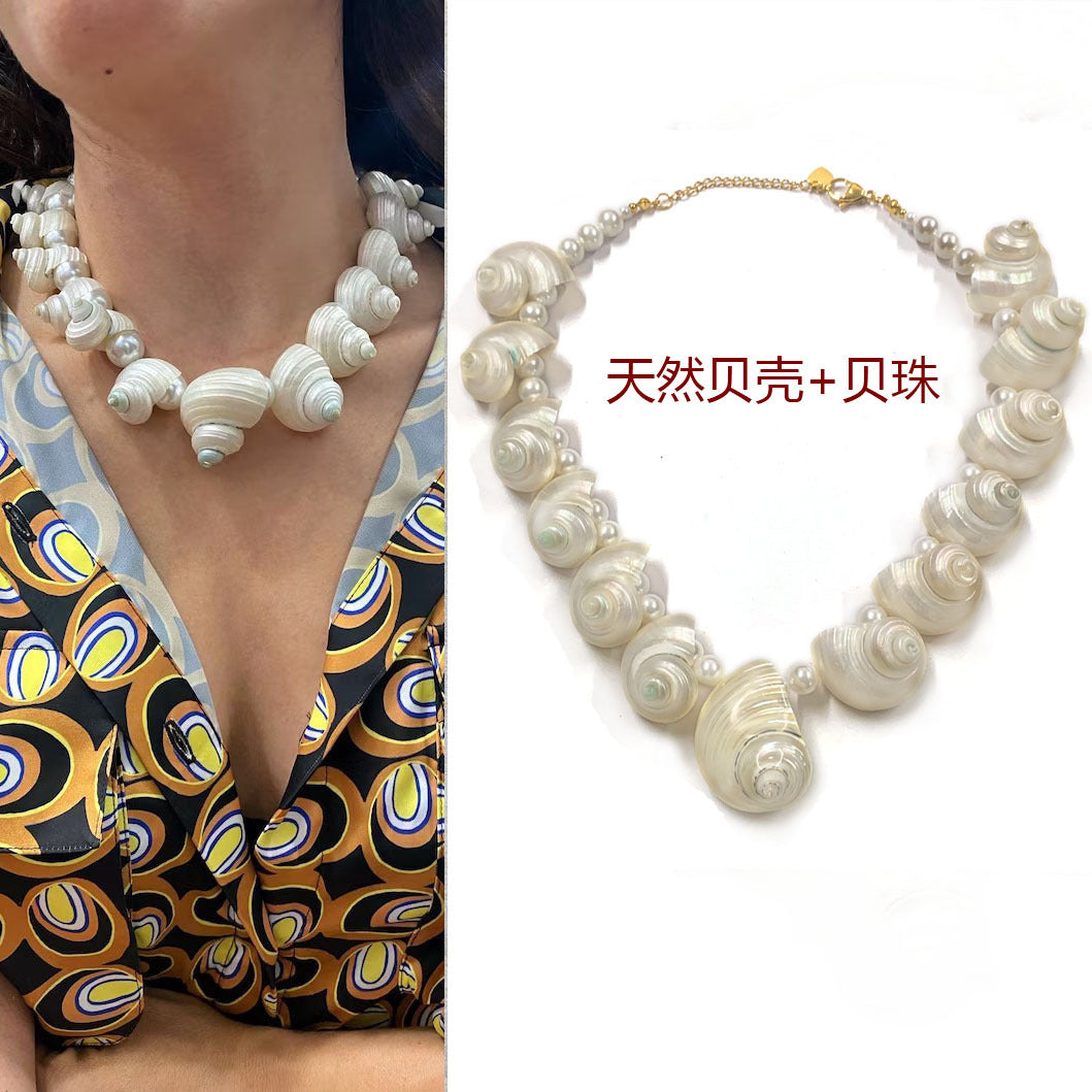 Shell necklace worn by a person and displayed on a white background with text.