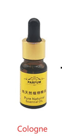 Bottle of Parfum cologne with dropper on a white background