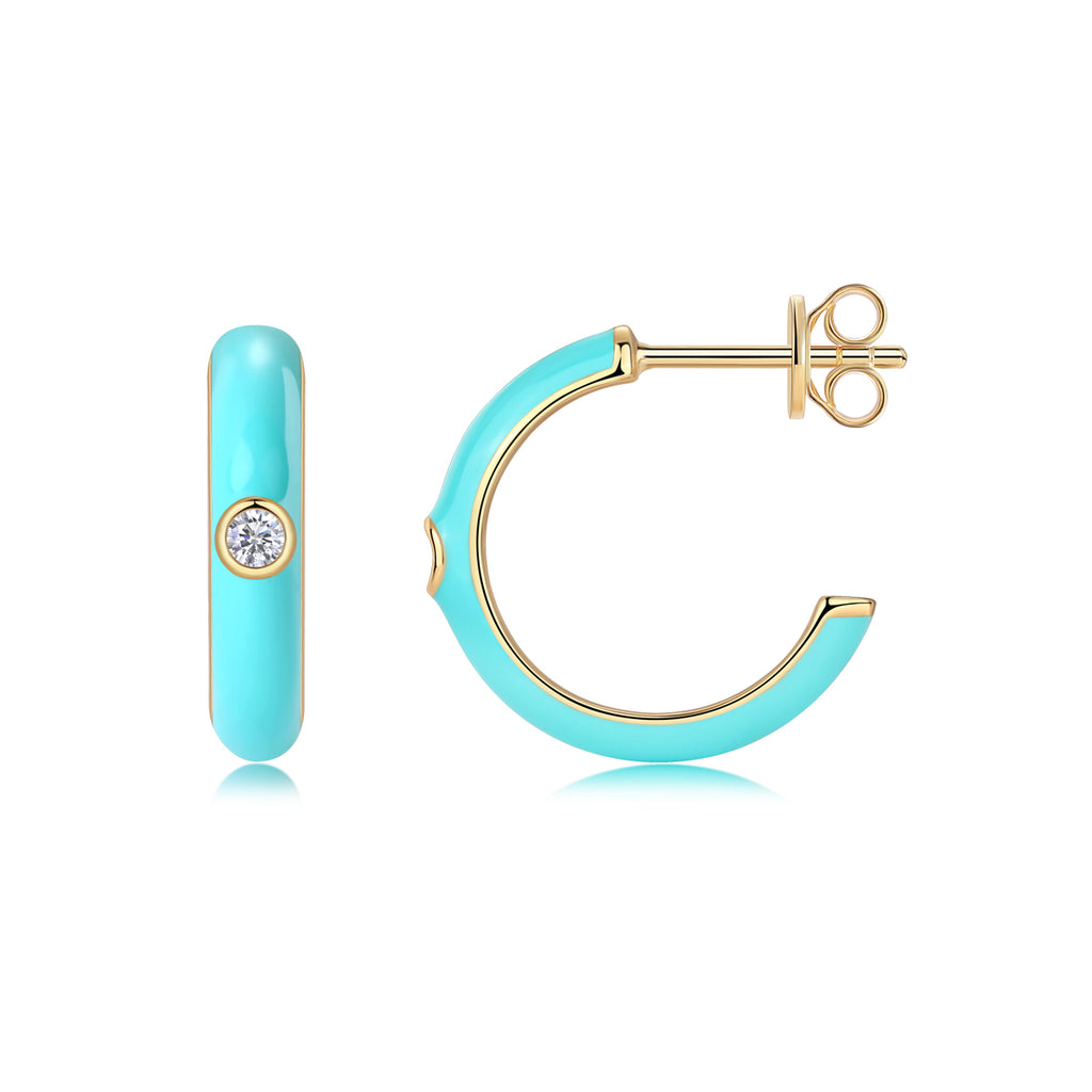Turquoise hoop earring with gold accents on a white background