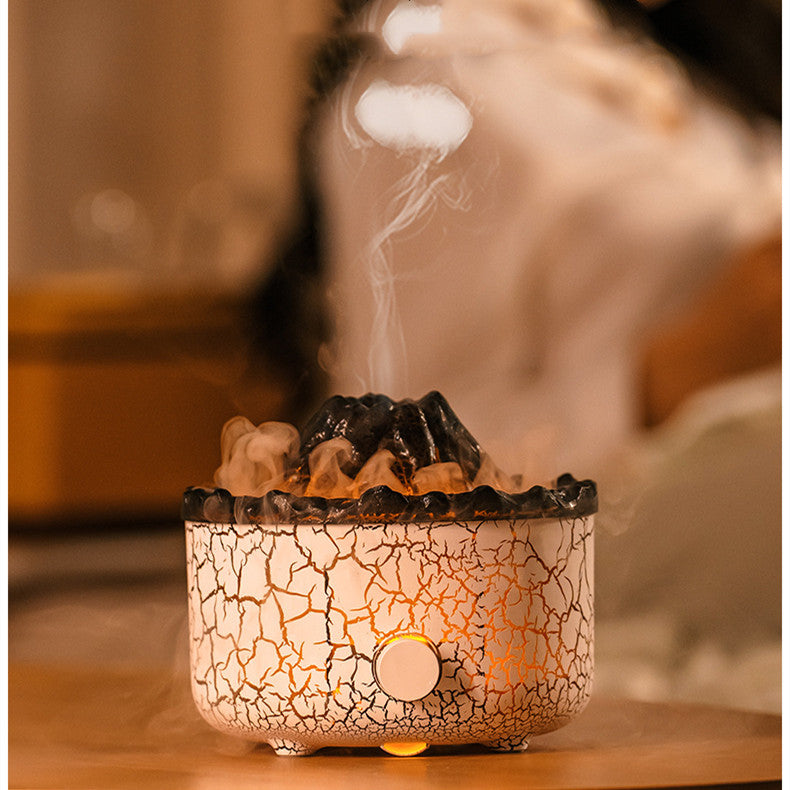 Ceramic diffuser with cracked design emitting steam on a wooden surface.