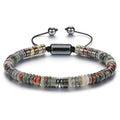 Multicolored beaded bracelet with a silver clasp on a white background