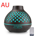 Aromatherapy diffuser with wooden texture and teal lights, accompanied by a remote control on a white background.