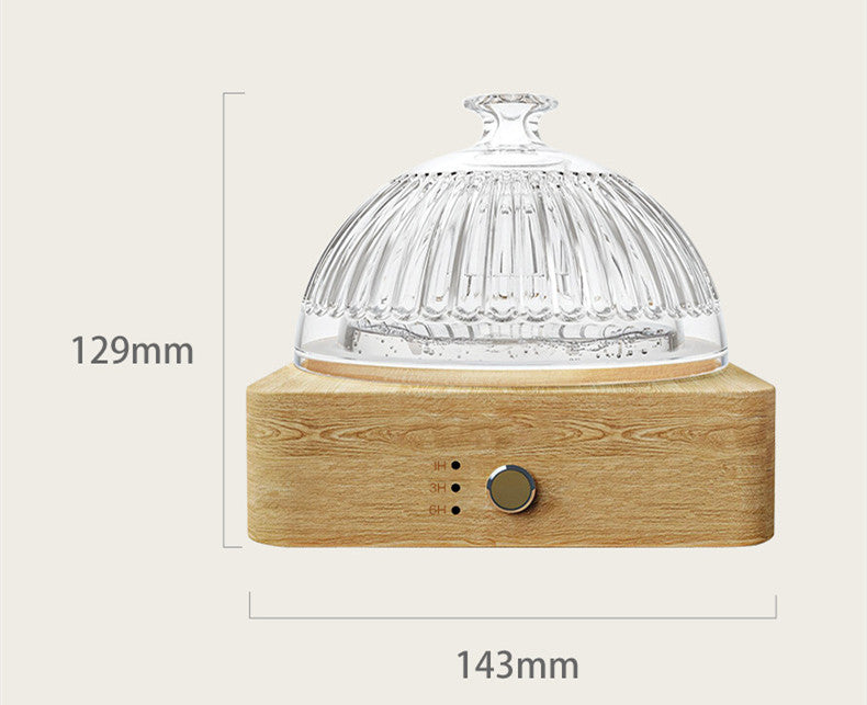Glass dome on a wooden base with measurements indicated