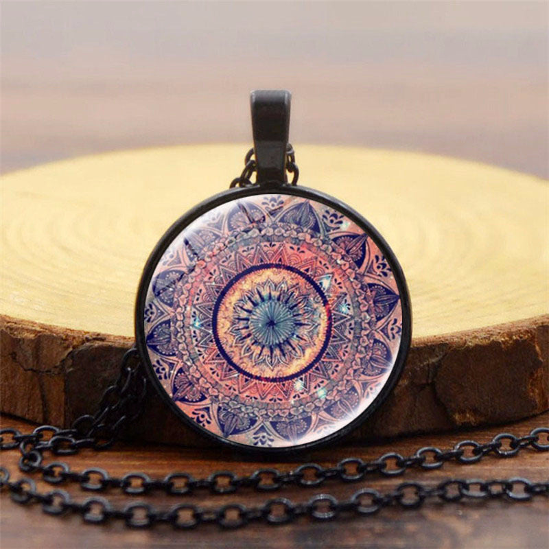 Necklace with a mandala pendant on a wooden surface