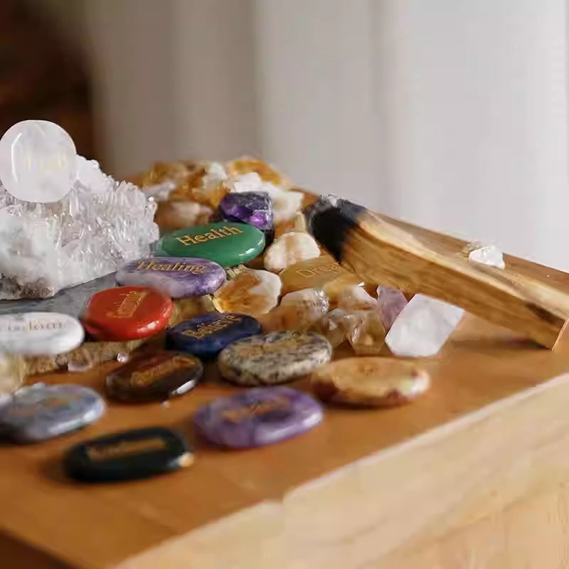 Collection of crystals and stones on a wooden tray with labels