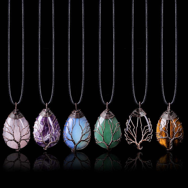 Set of six wire-wrapped stone pendants on black backgrounds