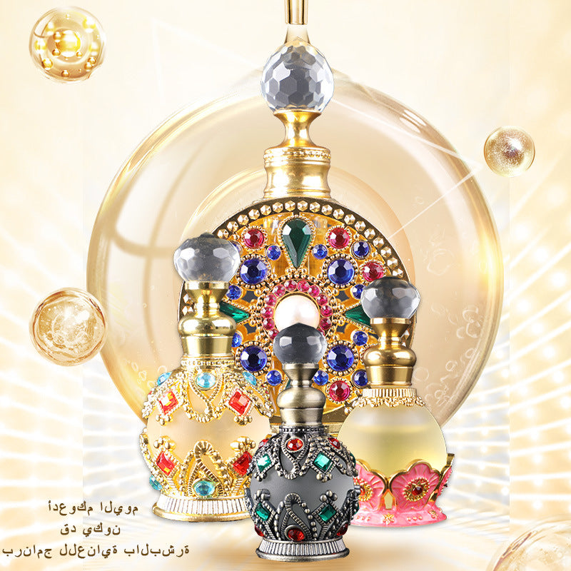 Decorative perfume bottles with gemstones on a gold and beige background