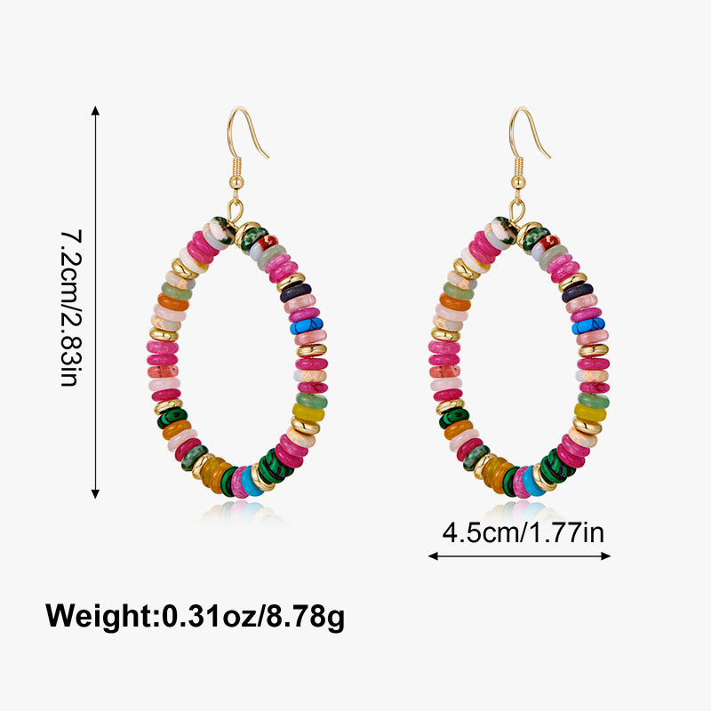 Colorful beaded earrings with measurements and weight on a white background
