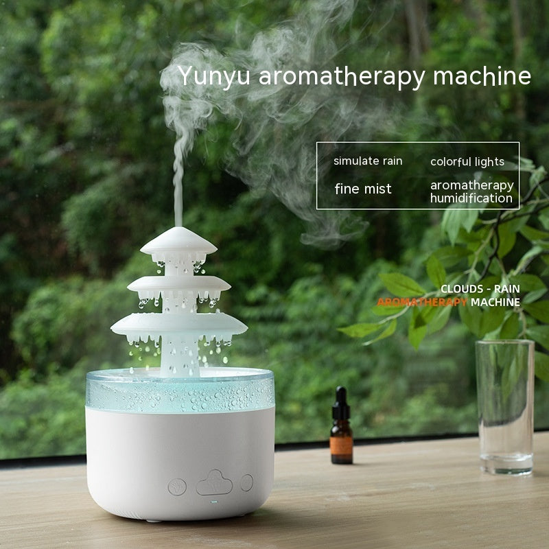 Yunyu aromatherapy machine emitting mist with greenery in the background