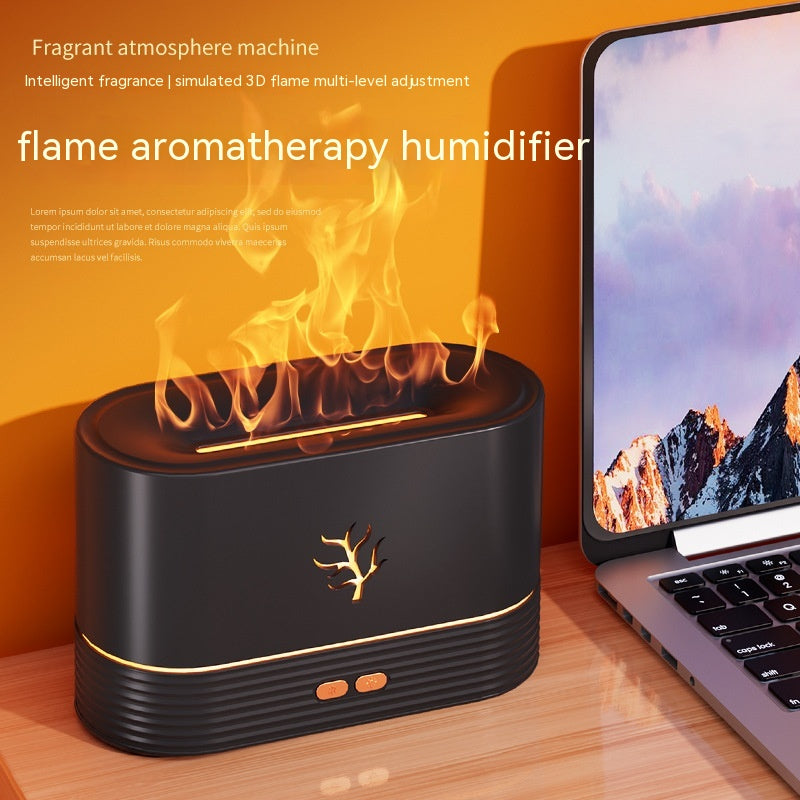 Flame aromatherapy humidifier with laptop on wooden surface