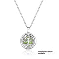 Silver necklace with a tree of life pendant on a white background