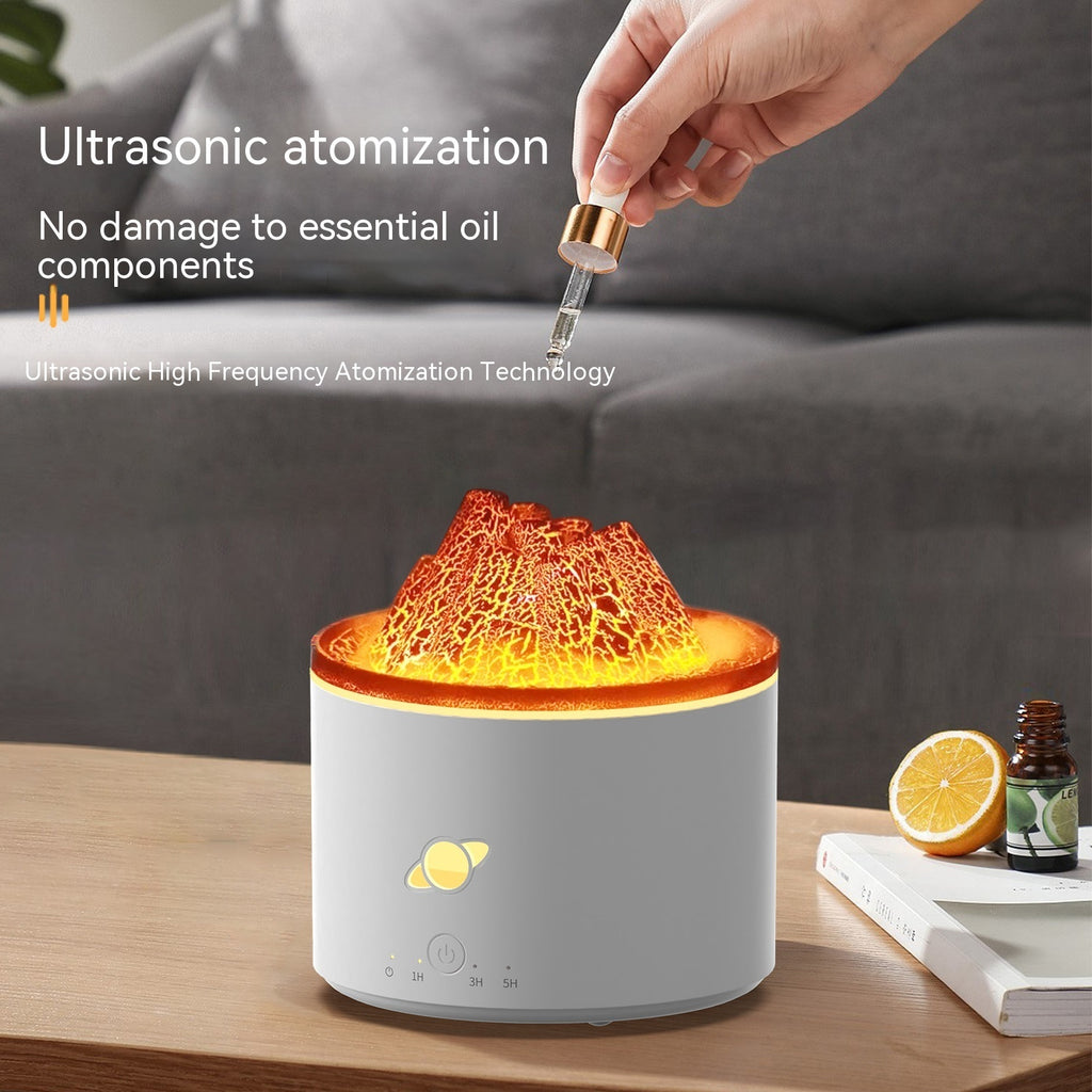 Ultrasonic diffuser with a hand using a dropper, surrounded by essential oils and lemon slices on a wooden surface.