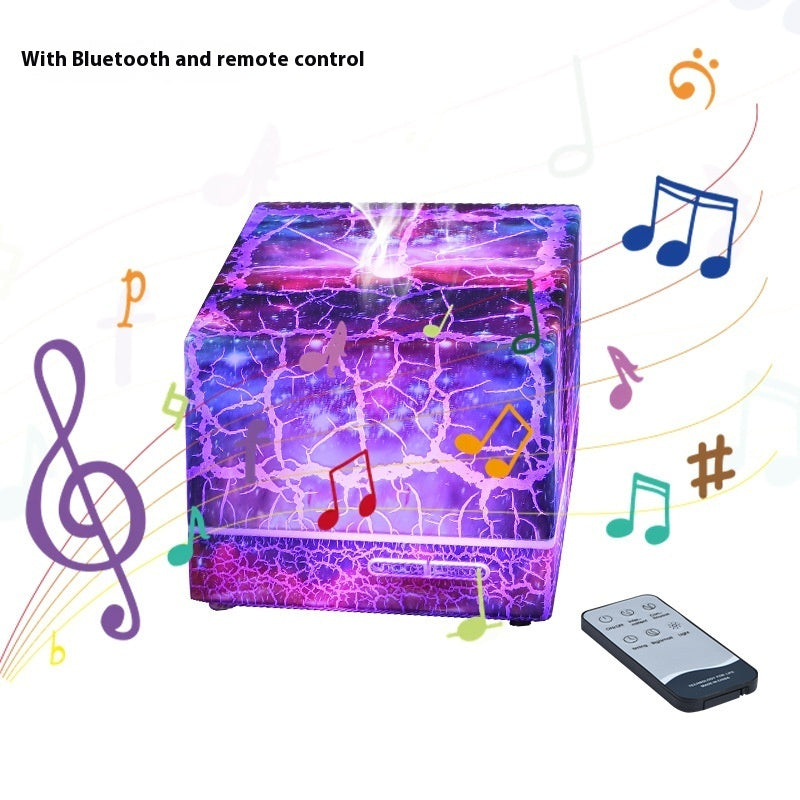 Music cube with Bluetooth and remote control features on a white background
