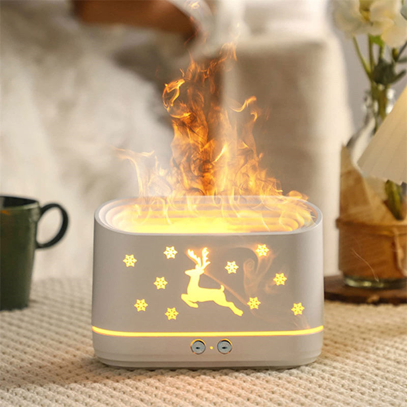 Flameless candle with reindeer design on a textured surface