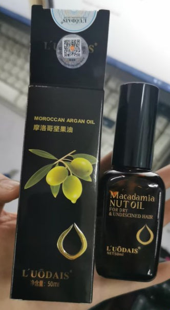 Macadamia nut oil bottle and packaging on a black background