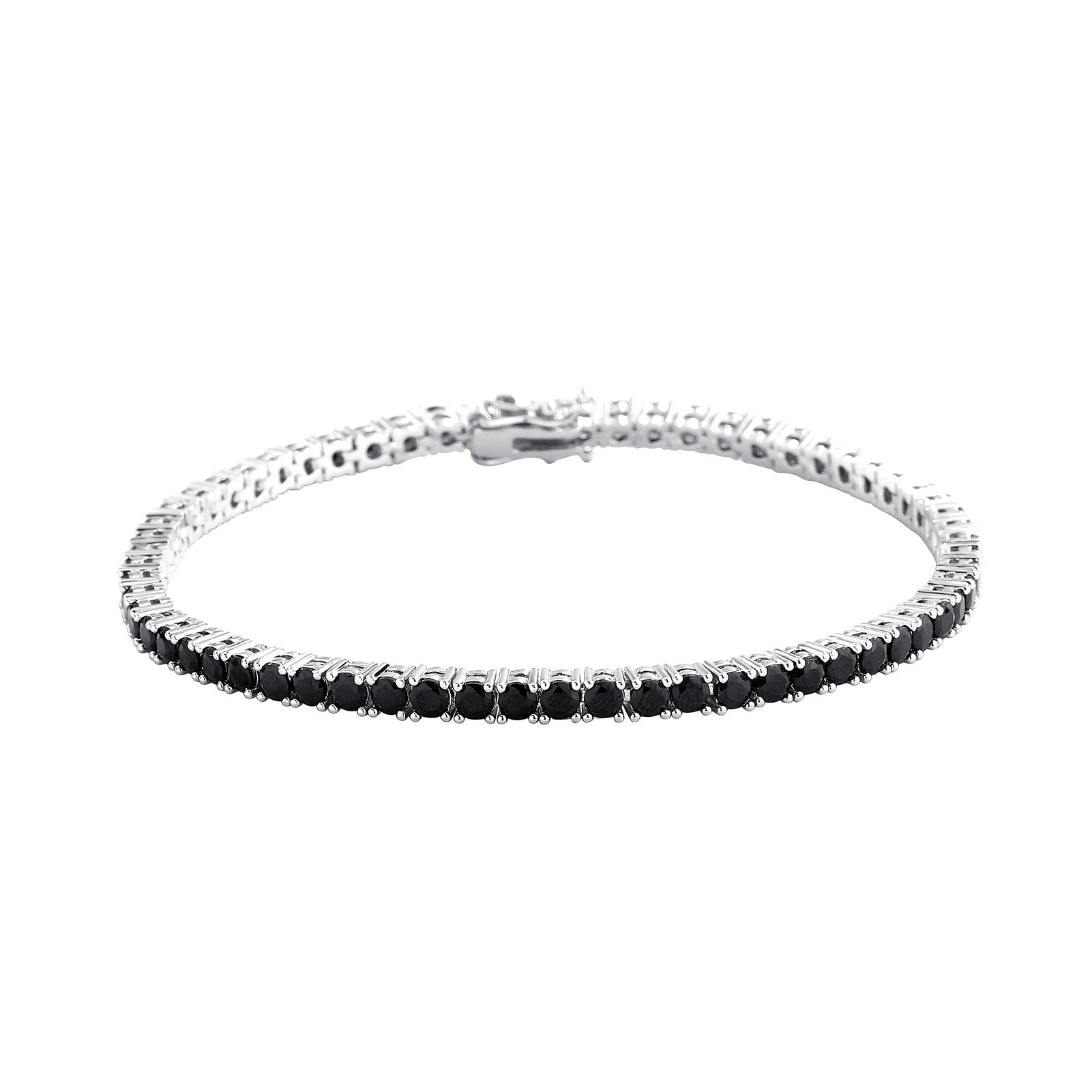 Silver bracelet with black stones on a white background
