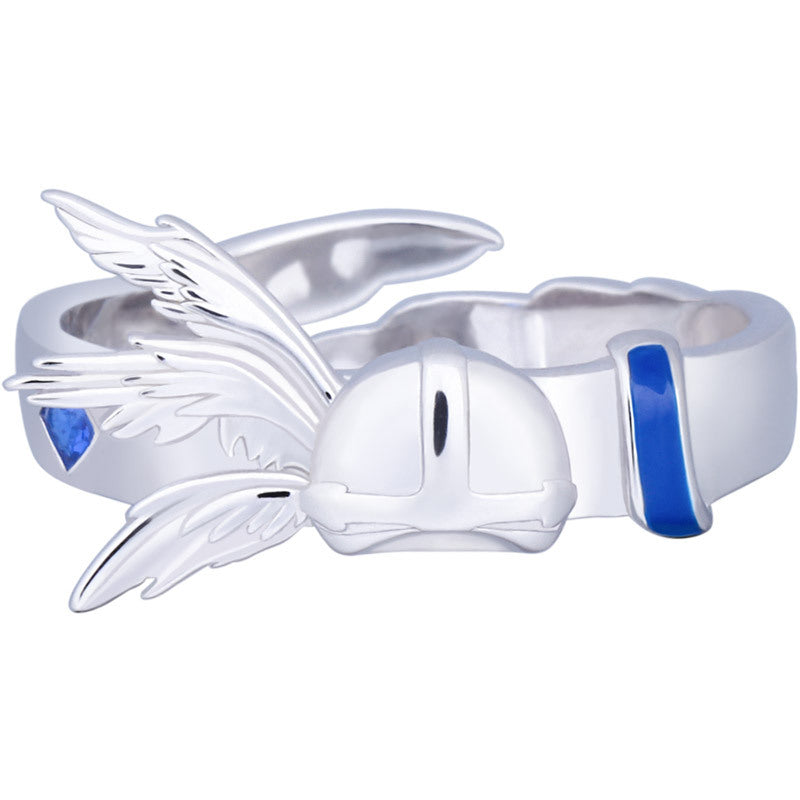 Silver earring with butterfly wings and blue accents on a white background