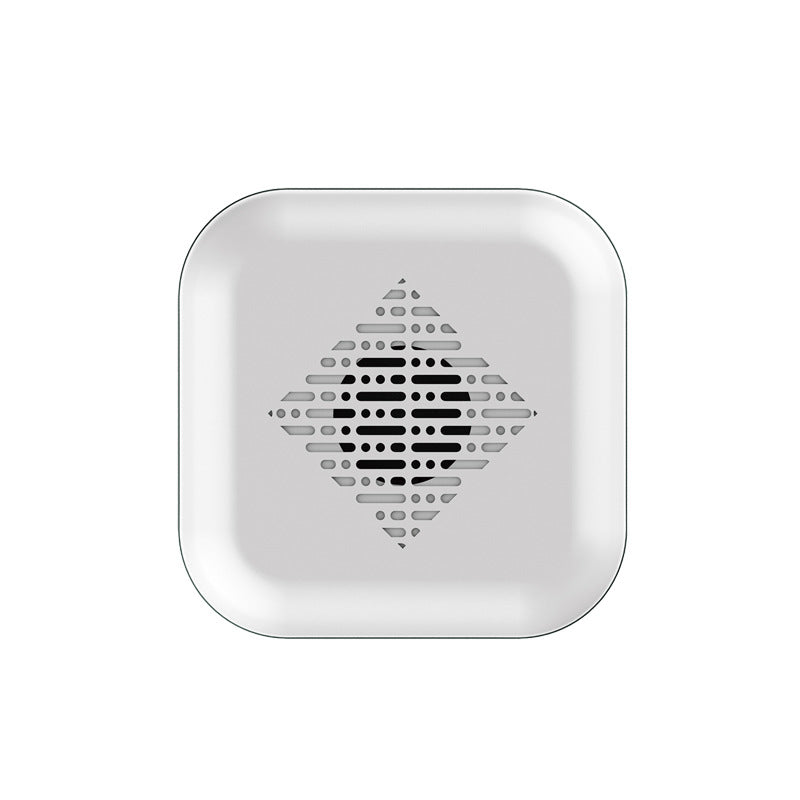 White square speaker with a pattern on a white background