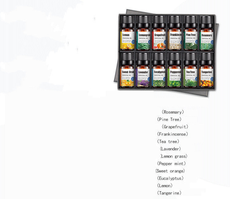 Set of essential oil bottles in a display case with labels on a white background