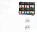 Set of essential oil bottles in a display case with labels on a white background