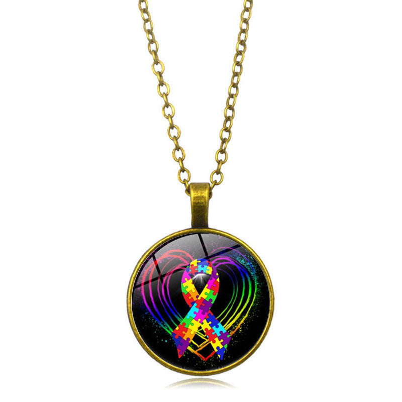 Necklace with a colorful ribbon pendant on a white background