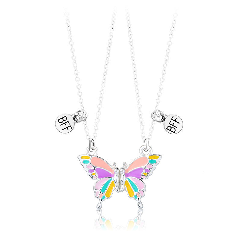 Butterfly necklace with 'BFF' charms on a white background