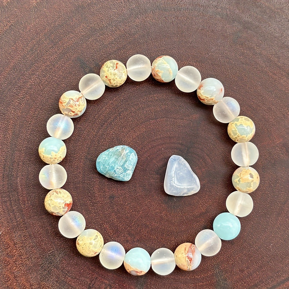 Round beaded bracelet with two stones on a wooden surface