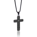 Black cross pendant necklace with engraved text on a white background