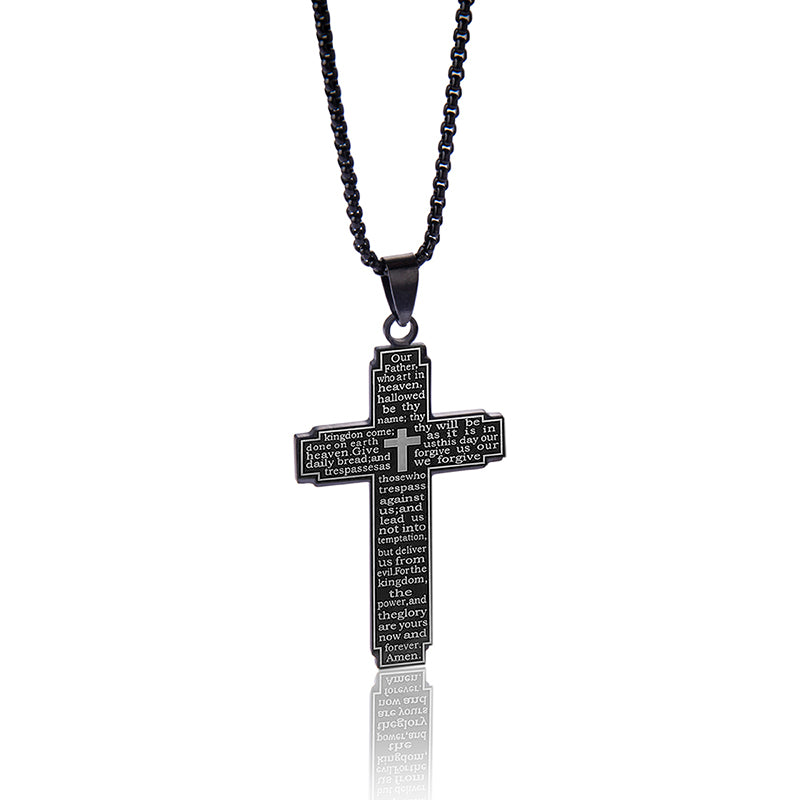 Black cross pendant necklace with engraved text on a white background