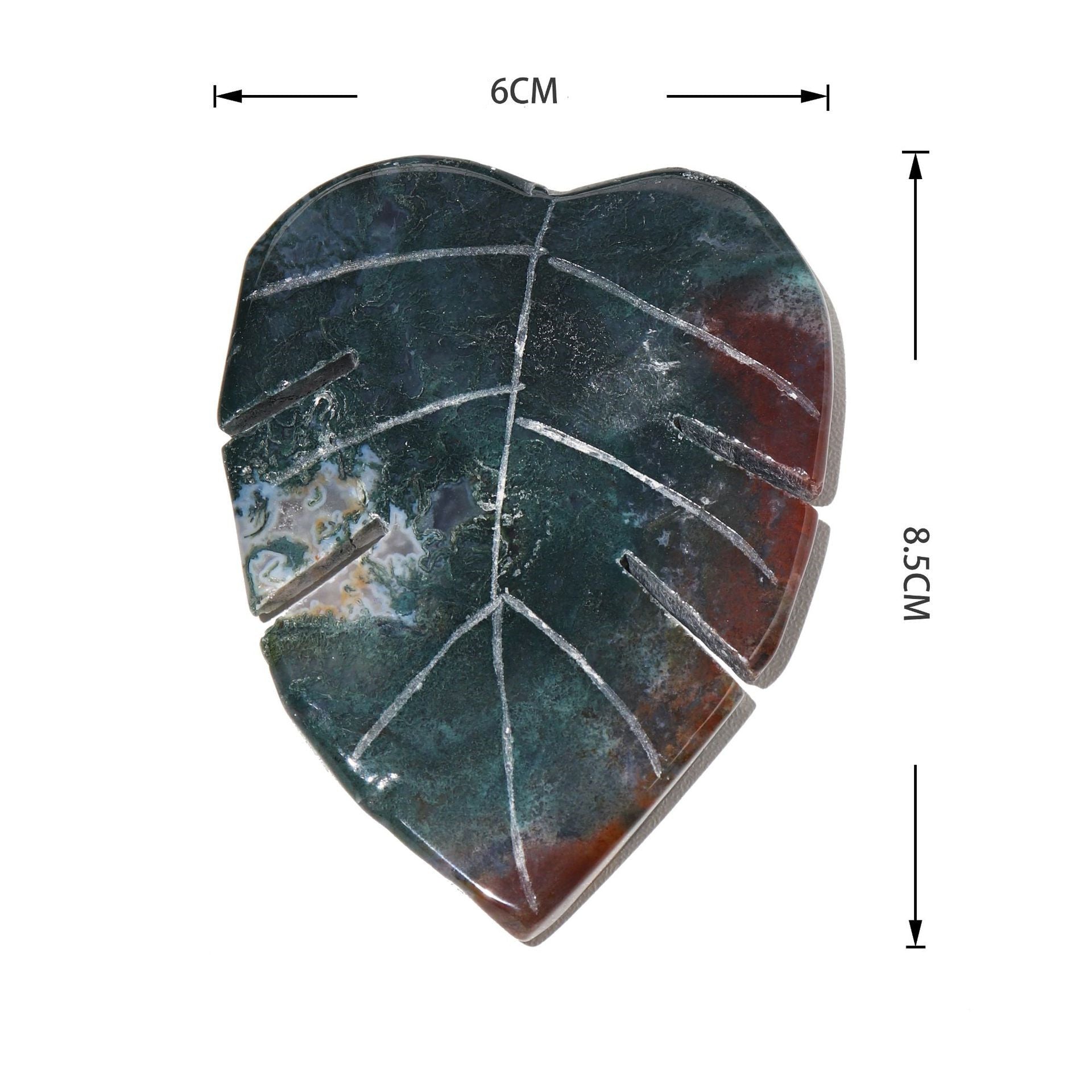 Heart-shaped stone with measurements on a white background
