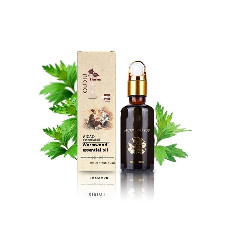 Aicao Wormwood essential oil bottle and packaging with green leaves on a white background