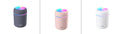 Three cylindrical devices with colorful LED lights on a white background
