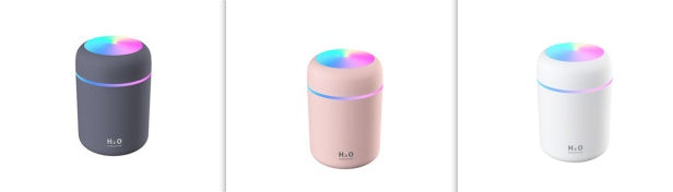 Three cylindrical devices with colorful LED lights on a white background