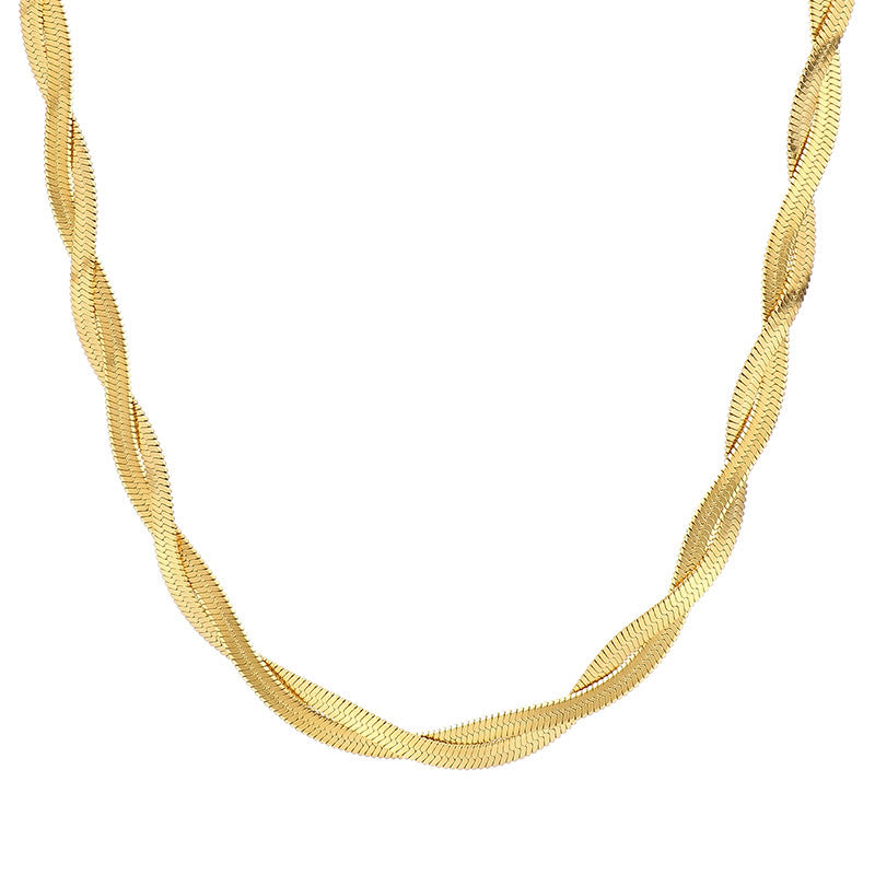 Gold necklace on a white background